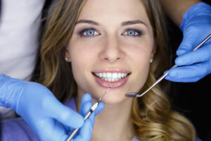 New Dental Patients Welcome - view from a dentist looking at a woman dental patient.